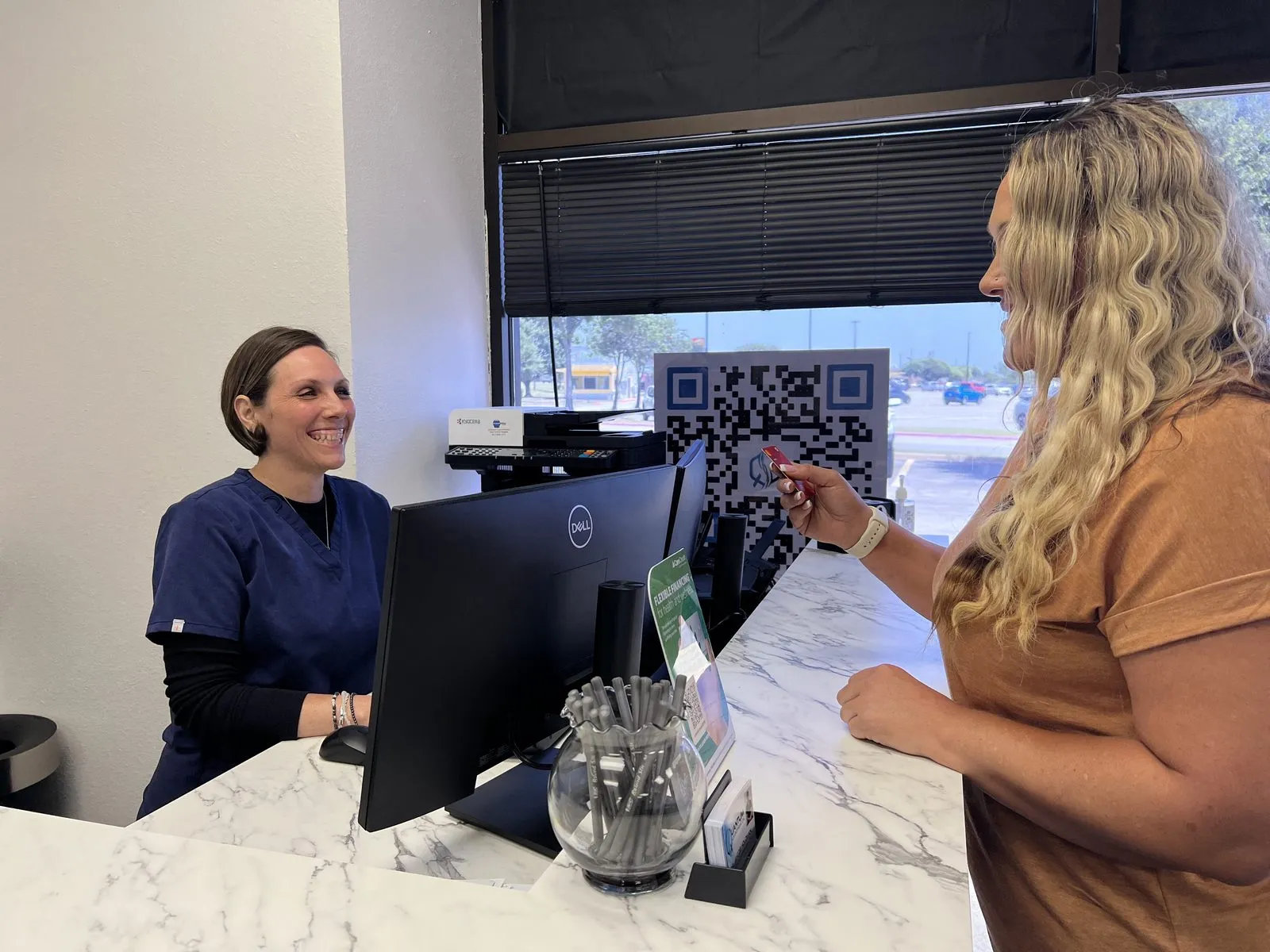 Front desk check-in at Quantum Chiropractic in Burleson, TX